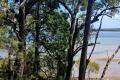 . Waterfront Land Opportunity 1200m2 with sweeping views! Island living at its best!