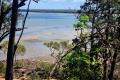 Rare Waterfront Opportunity - 1200m2 with Sweeping Views! Island living at its finest!