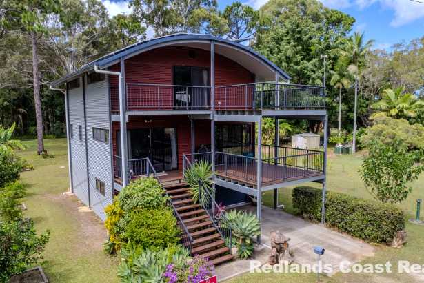 Light-Filled Steel Frame Home with Verandahs, Views & Huge Garage