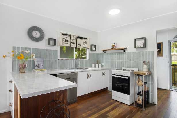 An Old Soul Island Home with New finishes..... blends Character and Modern Ease!