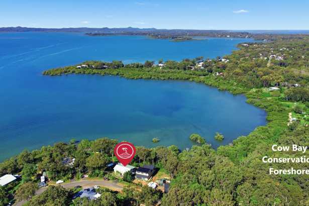 Absolute Waterfront, Exceptional Bay Views & Single-Level Living