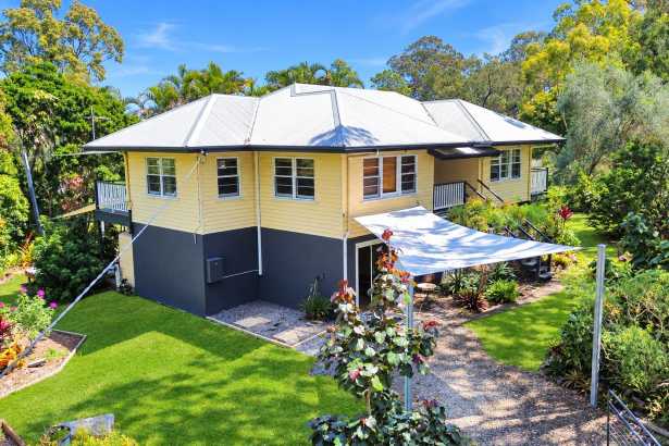 Queenslander with Water Glimpses and Dual Living Potential