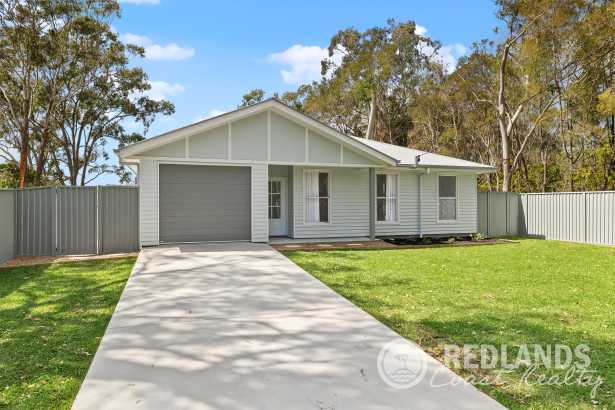 Coastal Modern Living in a Peaceful Russell Island Pocket