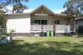 LOW SET IMMACULATE THREE BEDROOM TWO BATHROOM HOME