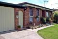 4 car carport with roller door
