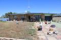 Solid 3x1 brick home on large block