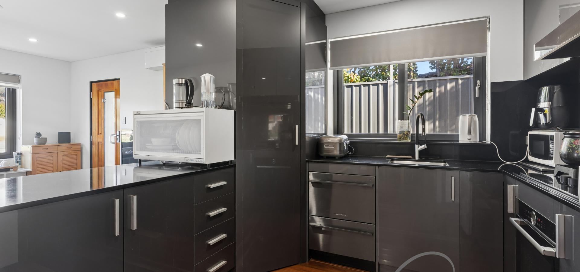 RENOVATED HOME WITH MASSIVE REAR GARAGE/WORKSHOP!