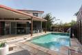 Family Oasis on a Dual Street Access Hilltop Lot