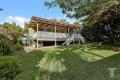 Timber Charm Meets Modern Potential: Build Your Future in Carina Heights!
