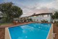 Renovated Family Home with Poolside Sanctuary and Dual Living Options