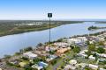 Top-Floor Riverside Living – Renovated and Ready to Enjoy