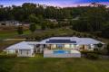 Stylish Near-New Acreage with Secondary Dwelling