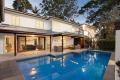 Cottage Charm Meets Modern Luxury In Blue Chip Location