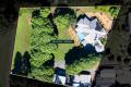Your Private Oasis: Luxury Home with Expansive Workshop