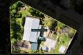 Invest, Renovate or Reimagine – Rare Land Holding with Elevation & Access