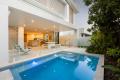 Coastal Luxe in Exclusive Beachside Estate