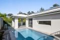 Peaceful Poolside Perfection Amidst Lush Greenery