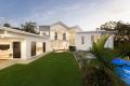 Modern Coastal Elegance: Height, Light & Ocean Views