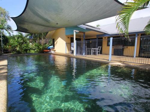 Image showcasing Tropical Property Mission Beach - Hello Families - 4 Bedrooms, Pool and ...