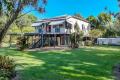 Tropical Acreage Lifestyle – Spacious Queenslander with Endless Potential !!