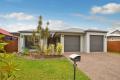 Low Maintenance Family Home with Modern Comforts & Pool!