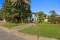 Renovator's Delight– Great Potential in Convenient Location!  