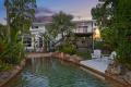 Tropical Oasis Meets Designer Renovation - Only 350m to the Beach