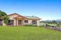 ELAVATED FAMILY HOME WITH IMMACULATE VIEWS - HUGE YARD & SIDE ACCESS
