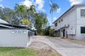 Coastal Townhouse with Pool & Beachside Convenience!