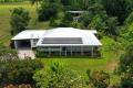 Private Acreage Retreat with Spacious Home, Sheds & Creek