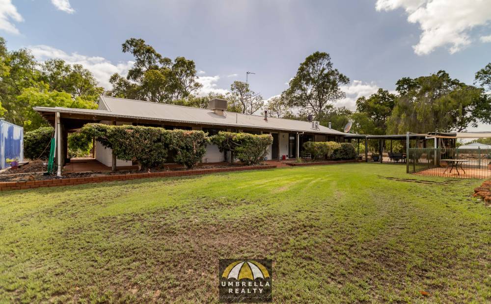 Umbrella Realty - Stunning Bush Block with a Large Shed!