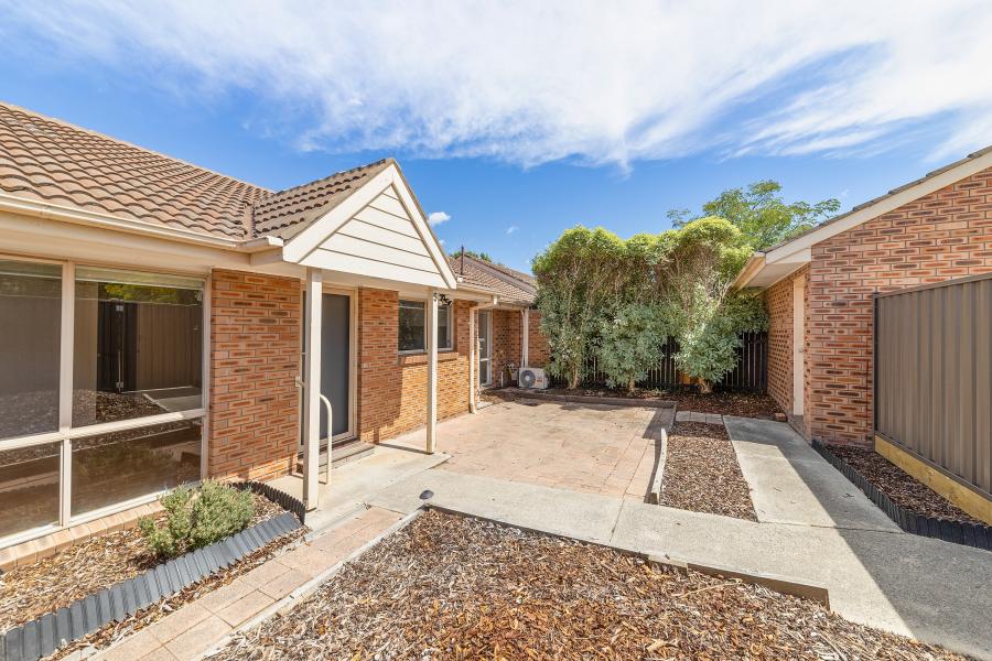 Single level townhouse with great courtyard spaces