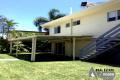 HIGHSET HOME ENCLOSED DOWNSTAIRS WITH INGROUND POOL