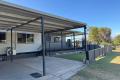 Price reduced!! Lowset 3 bedroom home with wrap around verandah and shed on a large corner block!