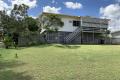 This highset 3 bedroom 1 bathroom home boasts a great inground pool