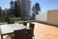 North facing Executive Penthouse a Stone Throw From The Beach