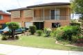 WELL KEPT SOLID BRICK HOME IN GREAT LOCATION