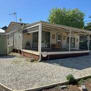 Seller of a House in Laura