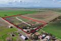 LAND WITH SHEDDING, WATER & POWER - 10.67HA