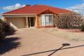 Spacious Family Home with Extensive Shedding