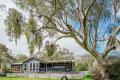 FAMILY HOME ON ACREAGE AMONG THE GUM TREES