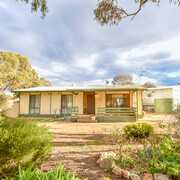 Seller of a House in Laura