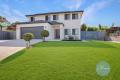 Stunning Five-Bedroom Home: A Perfect Blend of Luxury, Space, and Functionality!