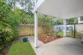 Easy Living on the Ground Floor with a Green Backyard!