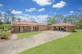HOME AMONG THE GUM TREES POSITIONED ON 1.07HA