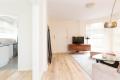 TWO BEDROOM APARTMENT + SUNROOM/OFFICE AND UNDERCOVER PARKING