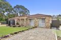 IMPRESSIVE FAMILY LUXURY IN PRIME SANDSTONE POINT POSITION!