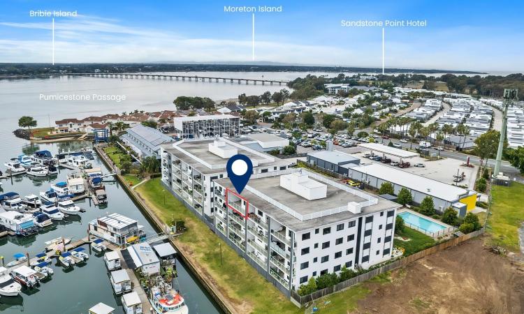 Elevated Sandstone Point Waterfront Lifestyle with Sweeping Passage Views