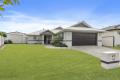SOLID SINGLE LEVEL HOME WITH LARGE SHED IN QUIET WELL-KEPT NEIGHBOURHOOD