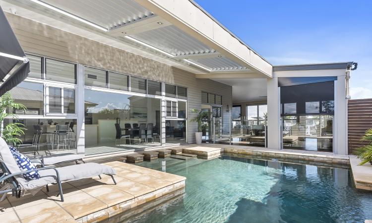 LIFESTYLE AND ARTISTRY - ARCHITECTURALLY DESIGNED CANAL FRONT PROPERTY